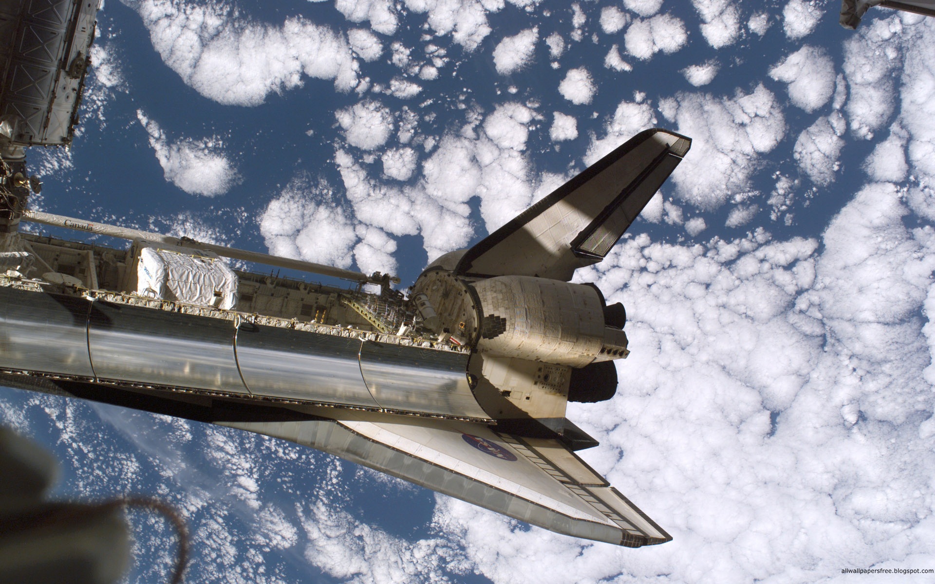 Фото космического корабля в космосе. Шаттл пристыкованный к МКС. Шаттл НАСА. Буран космический корабль Мрия. Стыковка шаттла.