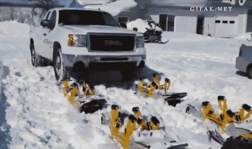 Truck using awesome attachable snow tread on tires! gif