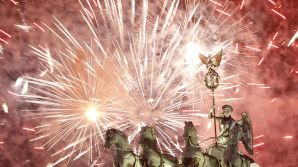 BerlinAn explosion of fireworks light up the Quadriga sculpture atop the Brandenburg Gate during a New Year's Eve party in Berlin.