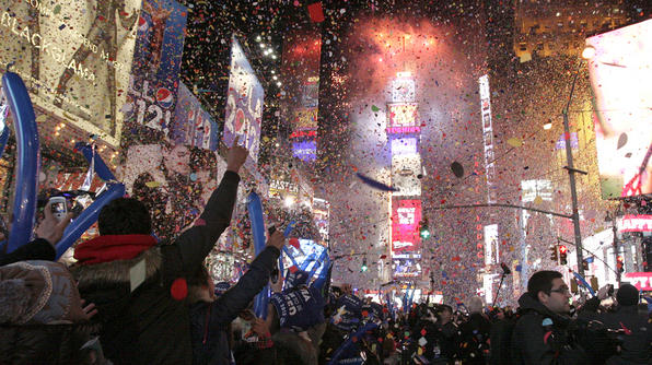 New York CityAt NYCs Times Square, confetti rains down on thousands of revelers celebrate the beginning of a new year at the stroke of midnight.