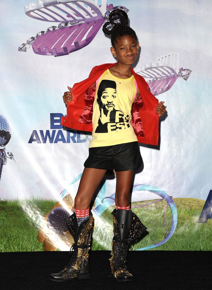 Willow Smith wearing Will Smith, while doing duckface.