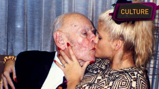 27-year-old playmate Anna Nicole Smith kisses 89-year-old husband, oil tycoon J. Howard Marshall II - 1994.