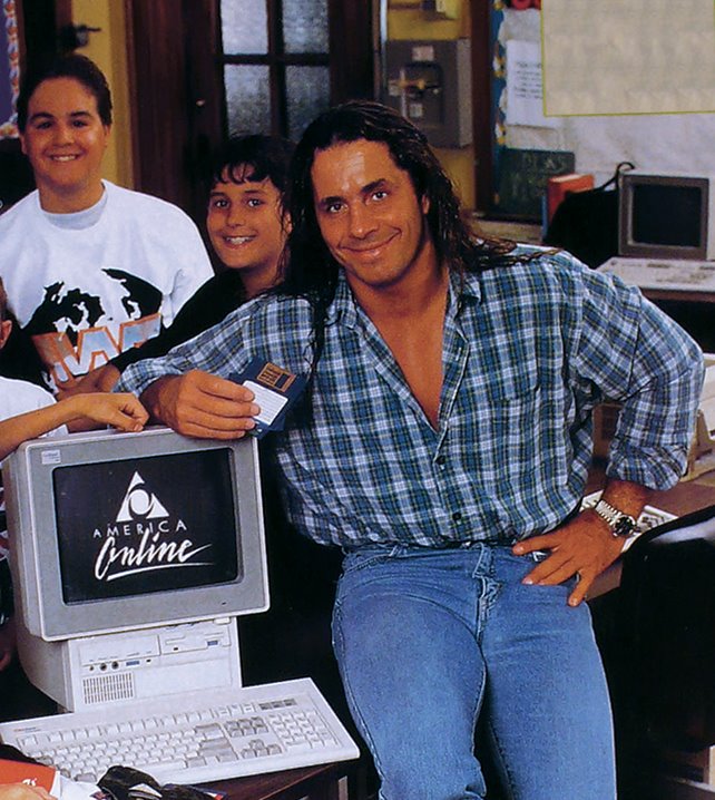 Bret "The Hitman" Hart with his AOL installation hard disc - 1994.