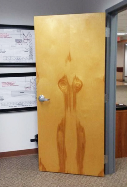 The wood grain on this door looks like a damp woman ran into it.