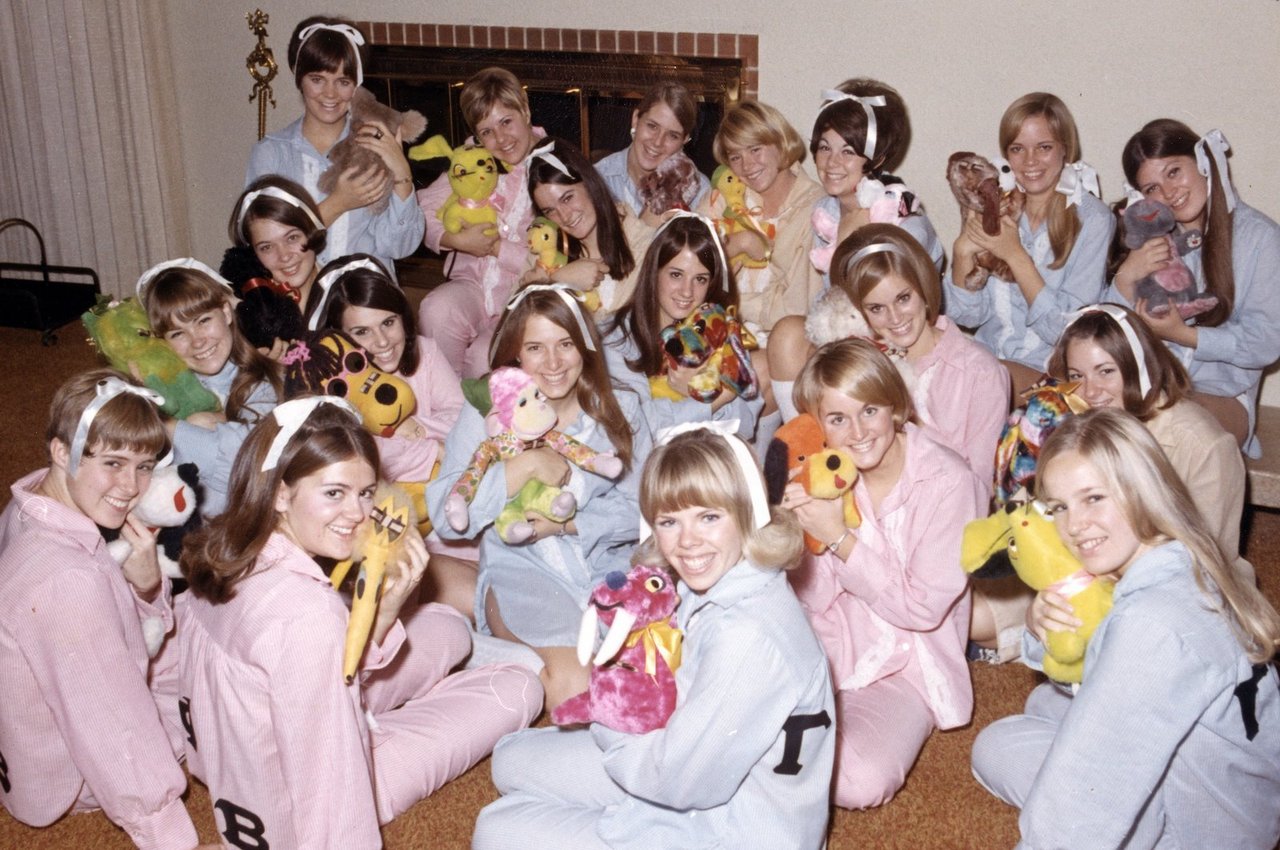 Sorority girls have a sleepover where they all dress like they are pre-teens with teddy bears