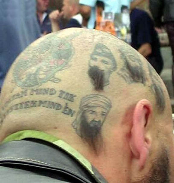 Funny--this guy has tattoos of Osama among others on his dome.  They have real hair beards.