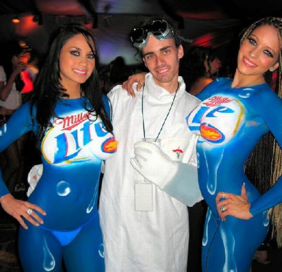 Body Painted girls are totally naked under their think layer of Miller Lite paint.
