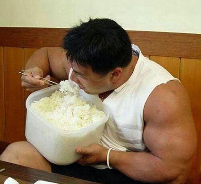 Sumo guy loves his rice!