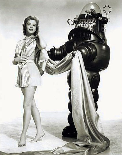 Anne Francis: posing with Robby the Robot from the movie Forbidden Planet. She died on January 3, 2011. She was 80.