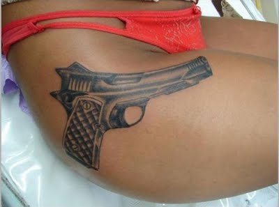 private girl gun tattoos