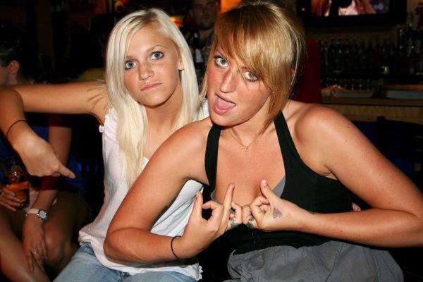 Chicks Throwing Signs