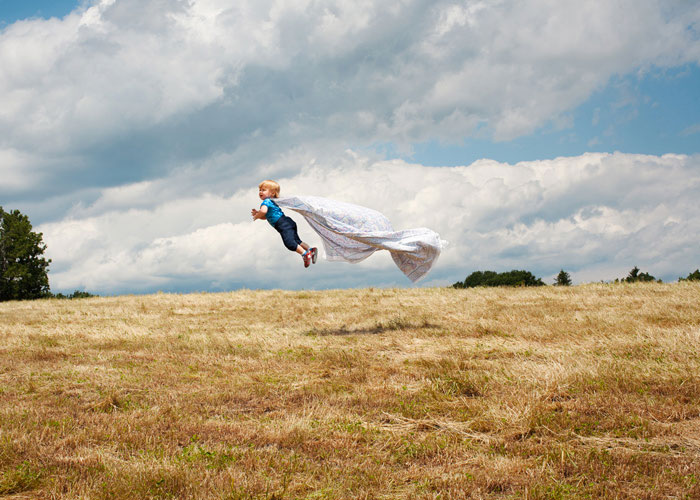 children flying photography