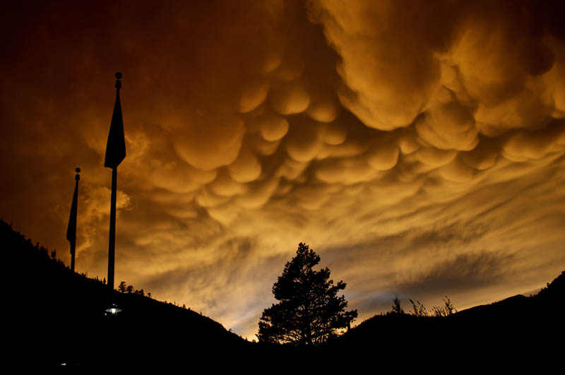 Mammatus clouds: a meteorological term applied to a cellular pattern of pouches hanging underneath the base of a cloud.