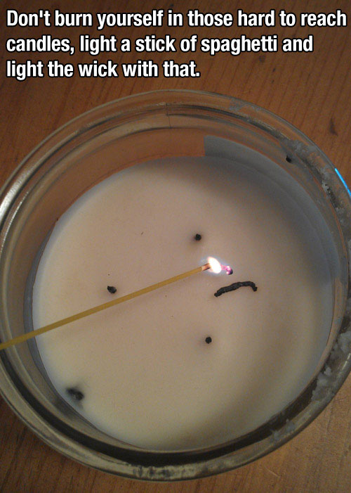 tips life hacks - Don't burn yourself in those hard to reach candles, light a stick of spaghetti and light the wick with that.