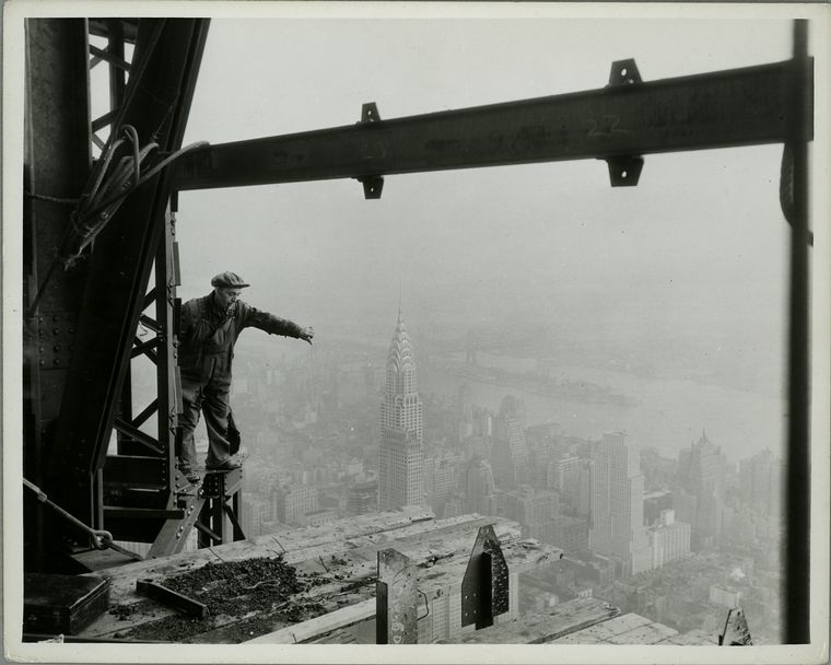 Atop Empire State- in construction Chrysler Bldg  Daily News in middle foreground.