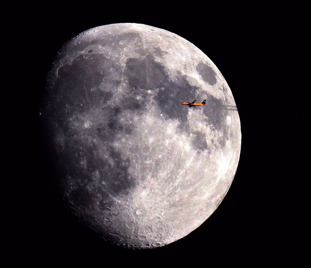 Just The Right Moment: Capturing Planes With The Sun And Moon