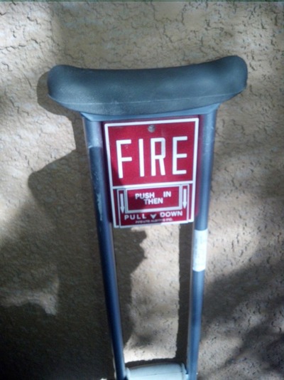 fire alarm and a crutch