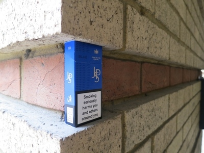 cigarette pack and smoking area wall