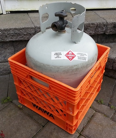 propane tank and milk crate