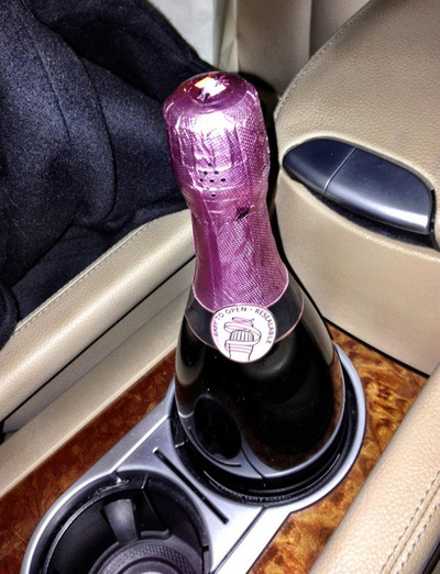 champagne bottle and car cup holder