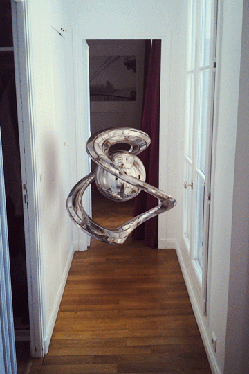 gifs - silver illusion near a door