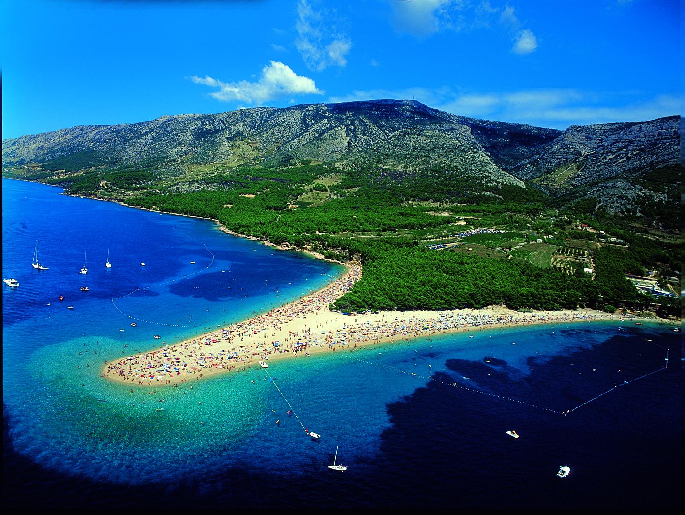Zlatni Rat Golden Cape is a narrow white pebble beach on a promontory near Bol, located 2 km west of Bol harbour, on the southern coast of the island of Bra269, Croatia. 
