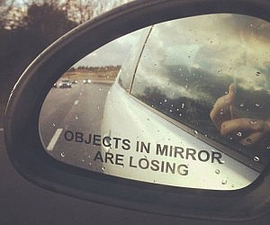 $1.95 Objects in mirror are losing sticker