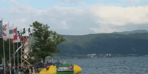 people are awesome gif person launched in the air into water
