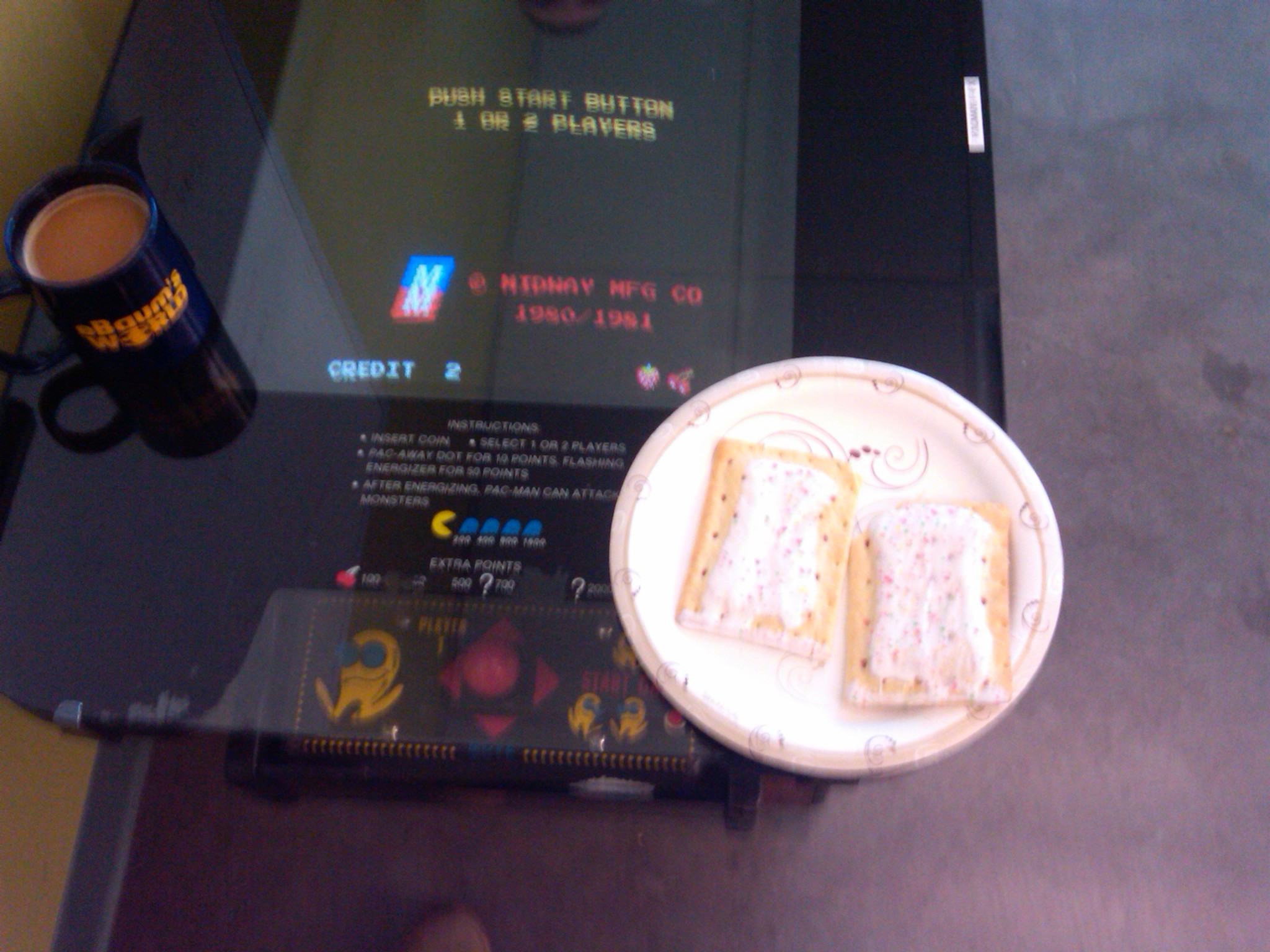 Pop Tarts, Ms Pac-Man and coffee in my mug.