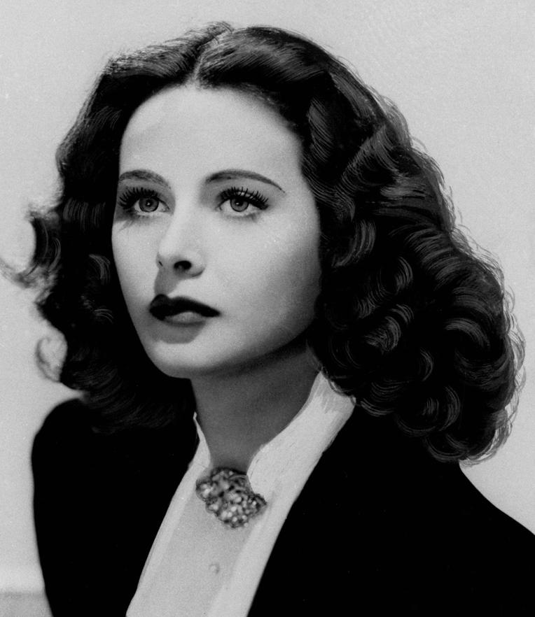 Heddy Lamarr. Australian actress. She teamed up with her neighbor, avant-garde composer George Antheil, to invent frequency-hopping spread-spectrum, a technology that helped prevent radio-controlled torpedoes from being jammed by the enemy. It wasnt actually used by the military until 1962, but Lamarr still had a more direct impact: She made a massive 7 million for war bonds in one evening by selling kisses.