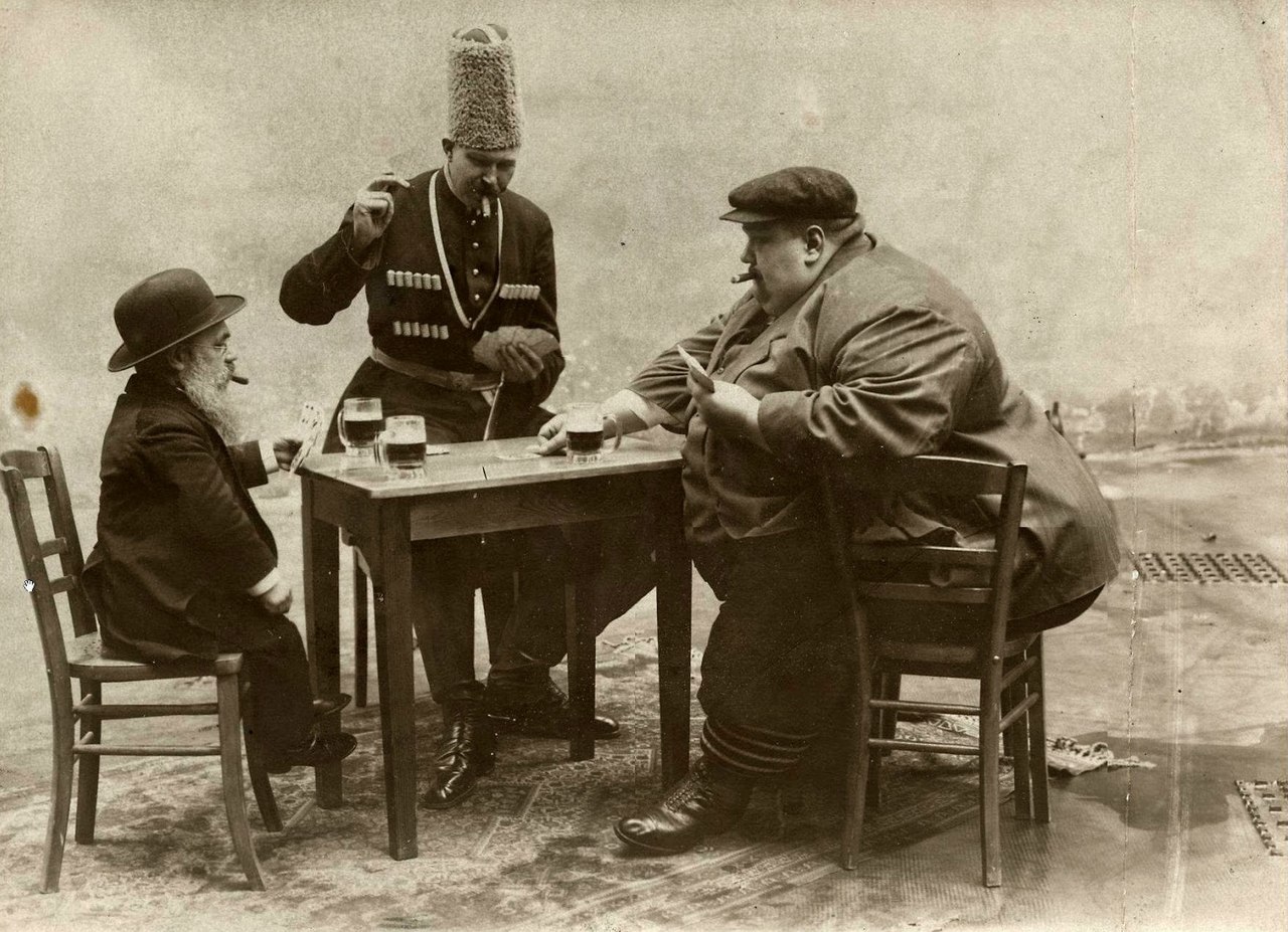 Tallest fattest and shortest man of Europe playing cards in 1913