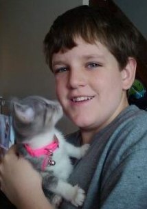 fat kid with cat