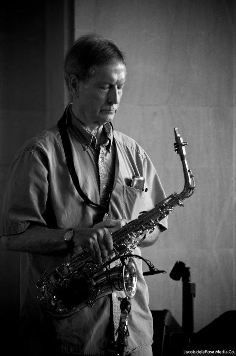 The saxophone player from a local band called "The Boomers". The location I was shooting had some awesome ambient light streaming through the windows which provided the perfect contrast of shadows for this black and white.