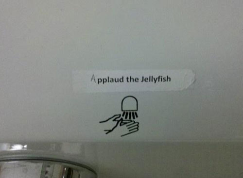 funny graffiti sign - Applaud the Jellyfish
