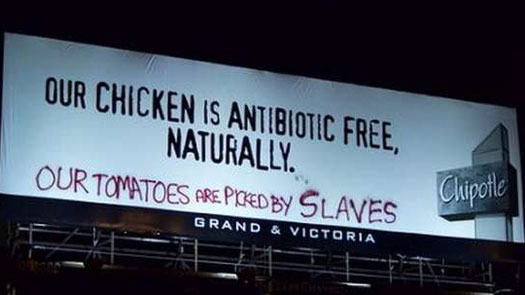 billboard graffiti - Our Chicken Is Antibiotic Free, Naturally. Our Tomatoes Are Picked By Slaves Chipotle Grand & Victoria