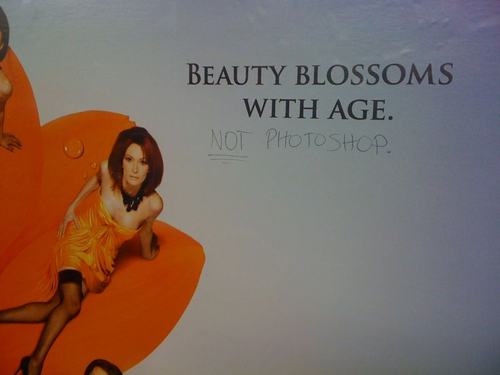 signs made funny with graffiti - Beauty Blossoms With Age. Not Photoshop