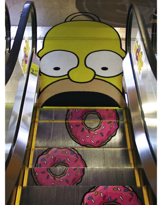Homer eating donuts for The Simpsons movie launch