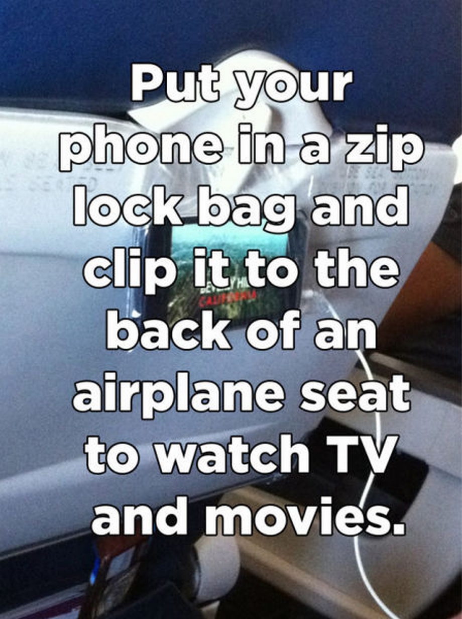 photo caption - Put your phone in a zip lock bag and clip it to the back of an airplane seat to watch Tv and movies.