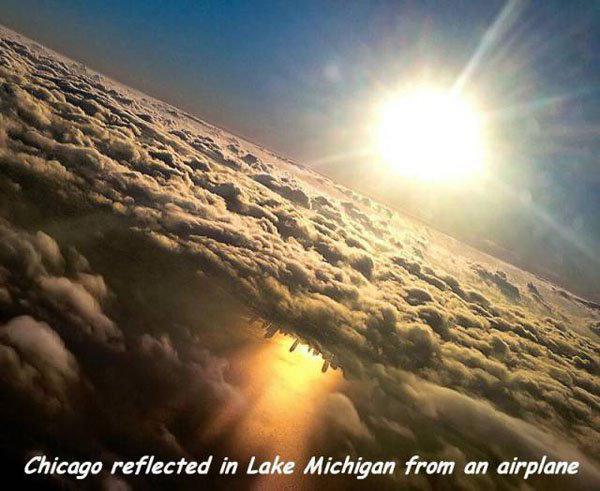 chicago skyline reflected in lake michigan - Chicago reflected in Lake Michigan from an airplane
