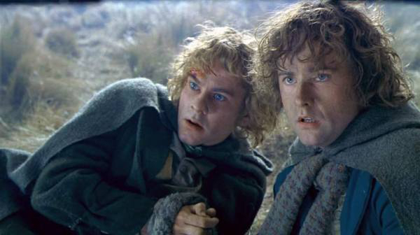 Lord of the Rings,  The Two Towers: In the scene where Pippin and Merry escape from the Uruk-Hai there is one big continuity error. While crawling away from the fighting behind him, their hands are firmly tied. Then, when a horse almost comes crashing down on Pippin his hands are magically free.