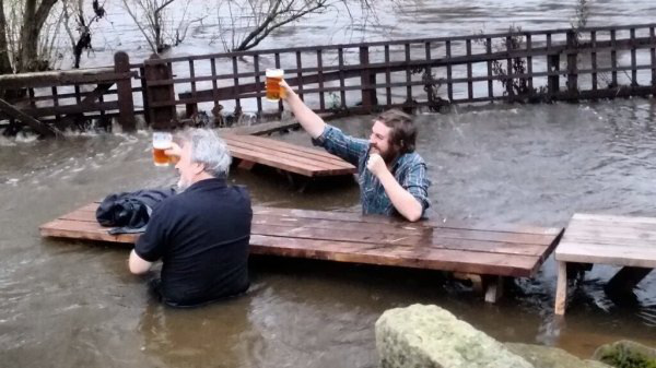 drinking beer in flood