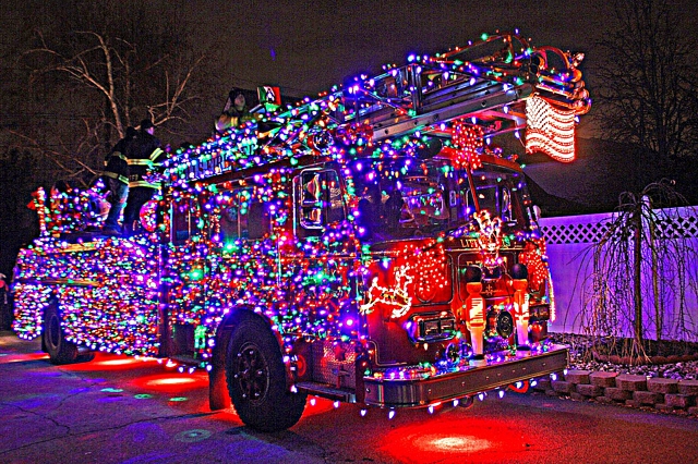 fire trucks decorated for christmas
