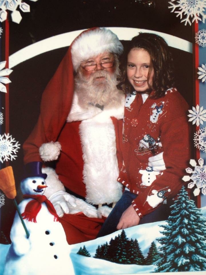 Check out the glorious progression of Mackenzie and Santa through the years:
