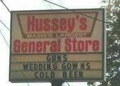 street sign - Hussey's General Store Emaines Largest Guns Wedding Gowns Cold Beer