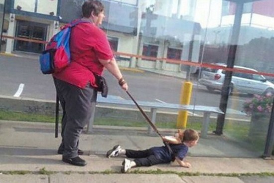 fat kid on a leash