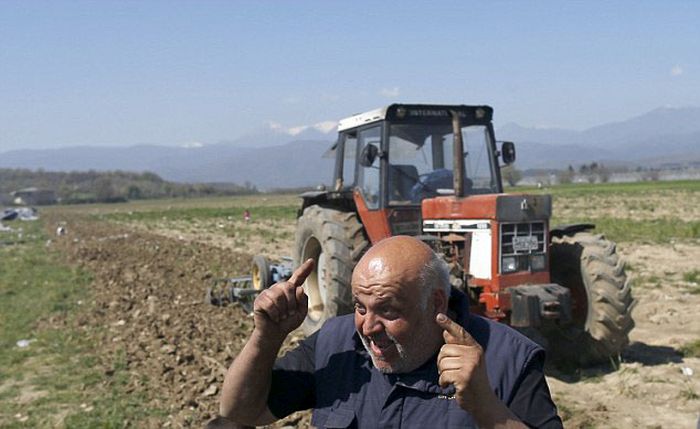 Greek Farmer Runs Down The Tents Of Syrian Migrants With His Tractor