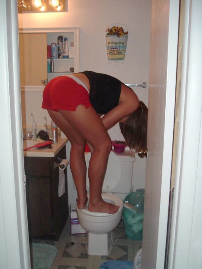 girls plunging toilets