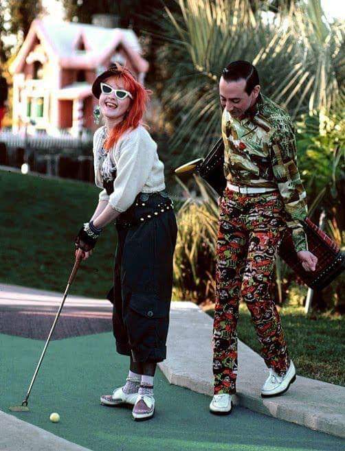 Pee-wee Herman and Cyndi Lauper playing mini-golf in the 80s