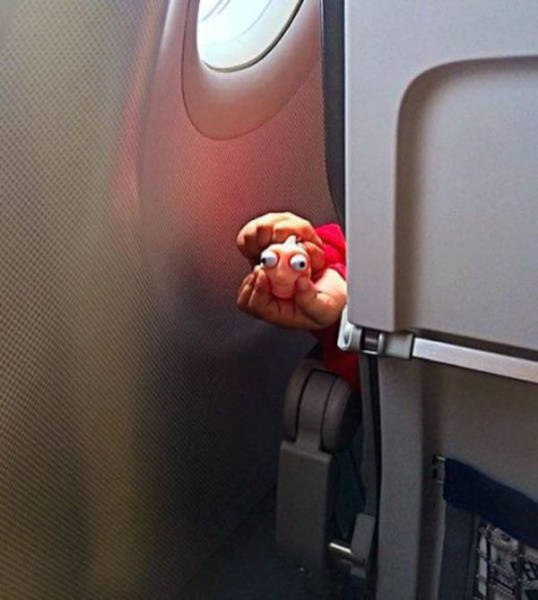 kid on front of the plane