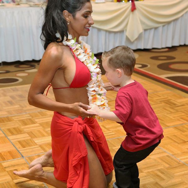 little boy staring at a woman's boobs